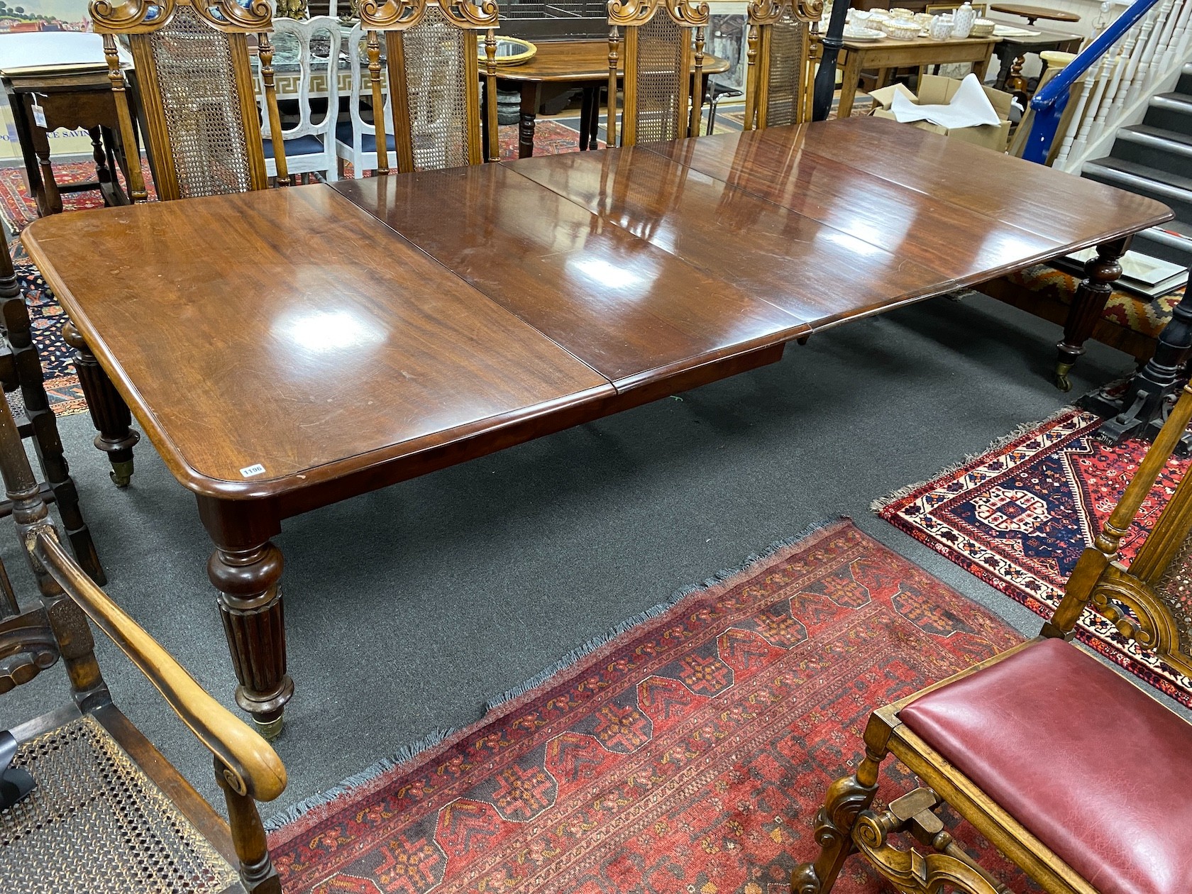 A Victorian mahogany extending dining table, 320cms extended, three spare leaves, depth 130cms, height 73cms.
